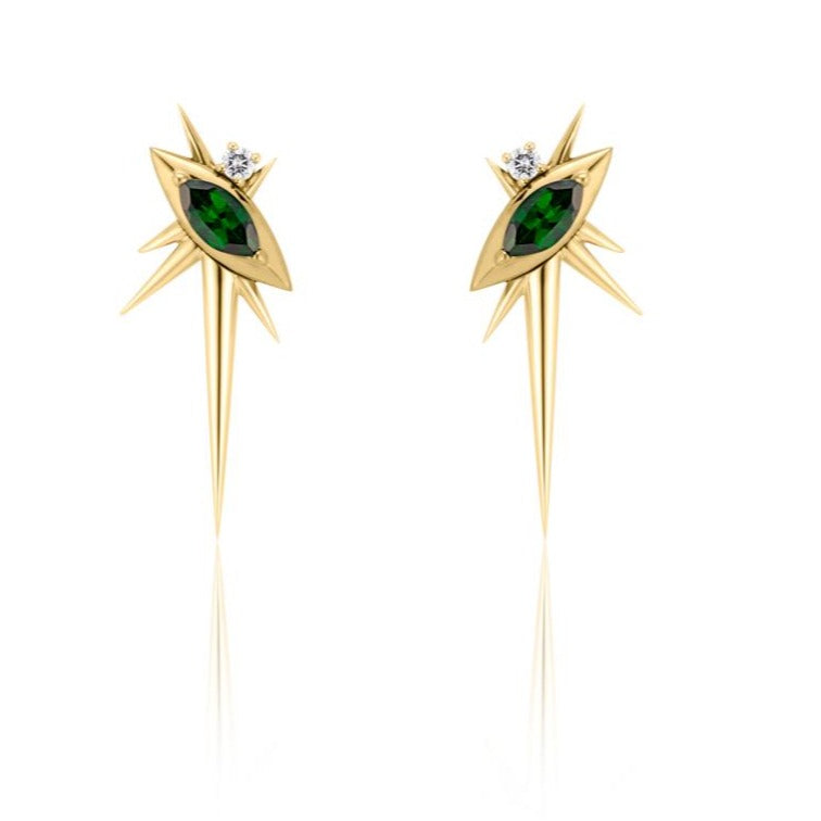 Front view of alternative drop earrings, each with 1 marquise-shaped tsavorite, set at a 45-degree angle, with a small round diamond above. 6 yellow gold spikes of varying lengths extend from the setting, with a large, long spike pointed down. 