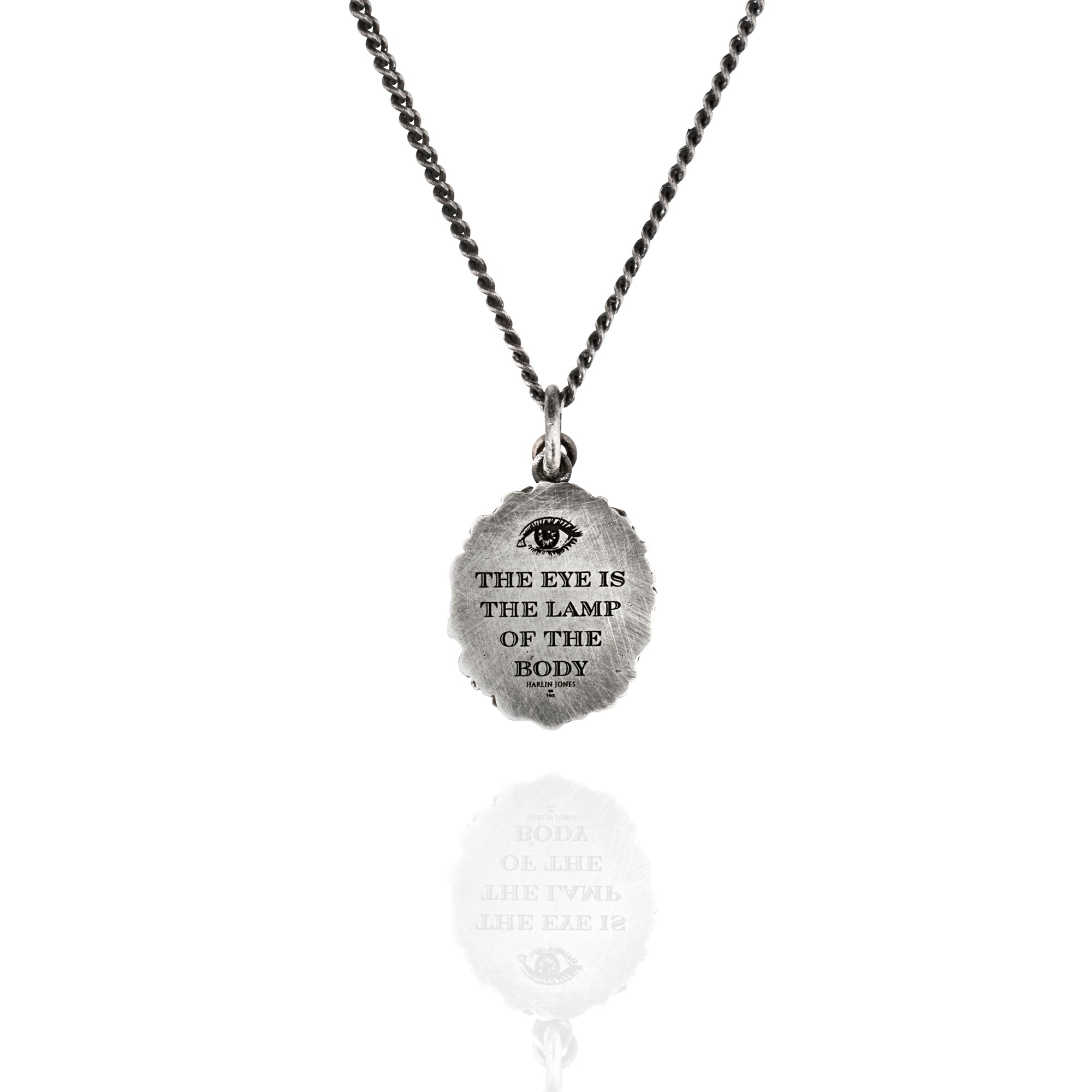 Back of Necklace with pendant with eye-shaped engraved and The Eye Is The Lamp of The Body engraved