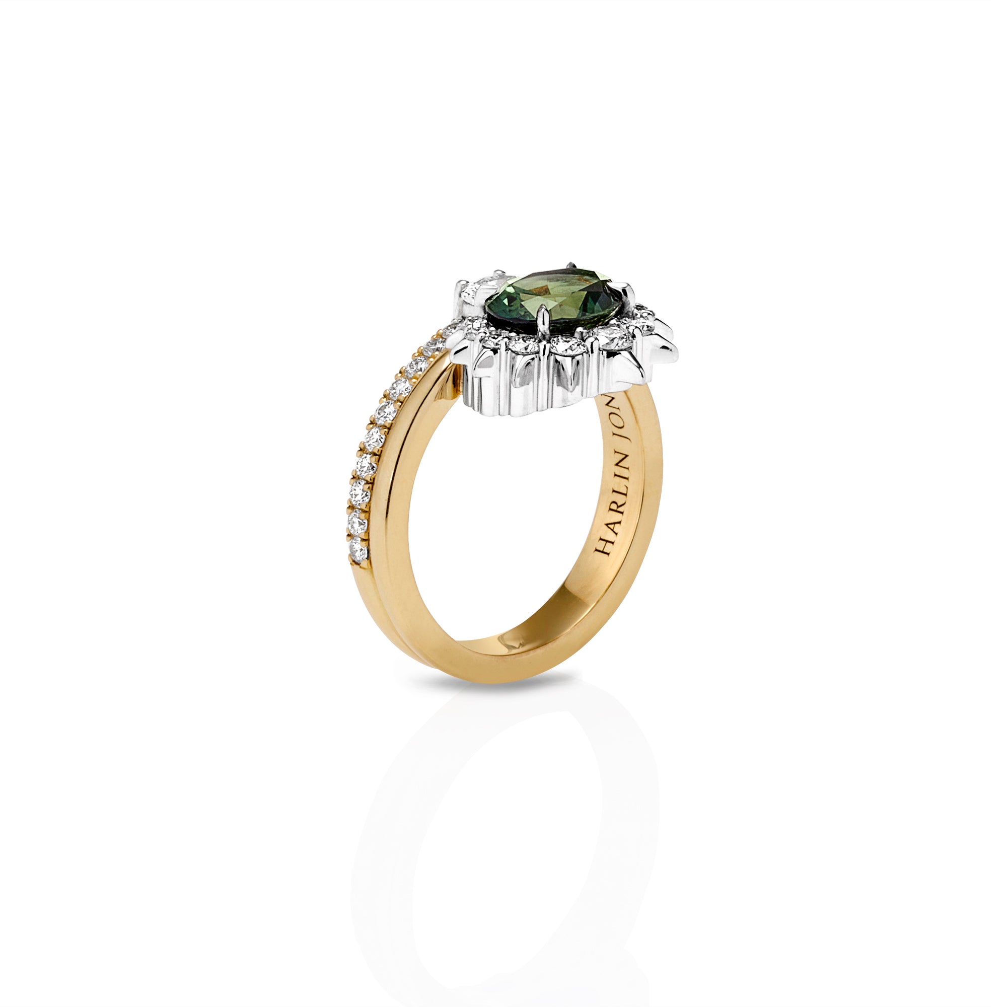 Other side angle, showcasing engraving on inside and diamonds on the ring