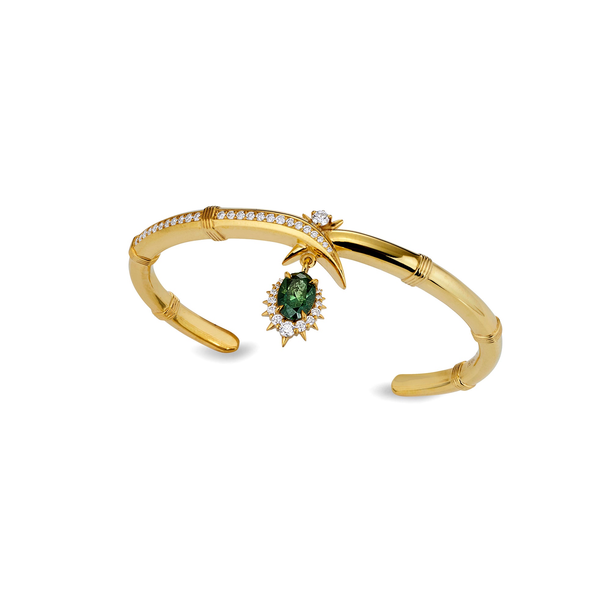  A gold bracelet featuring a green stone at the center, adorned with small diamonds along the band.