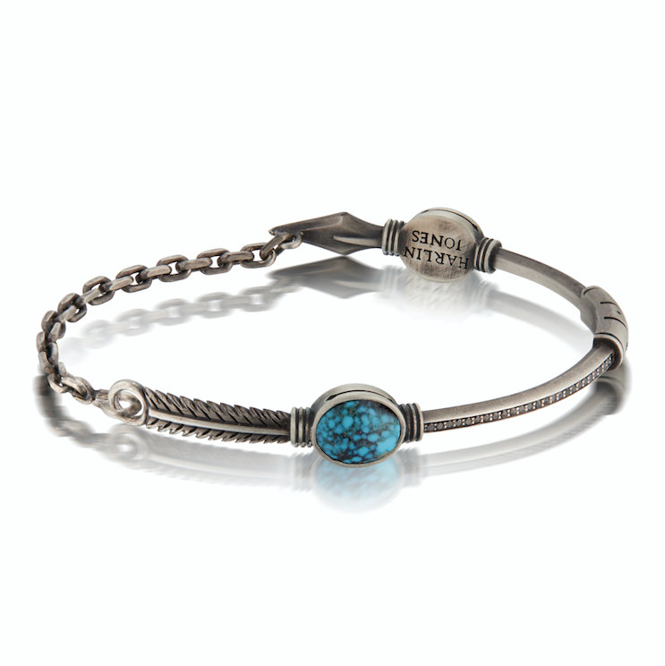 Blackened Silver Cuff with Turquoise stone and arrow & feather features. 
