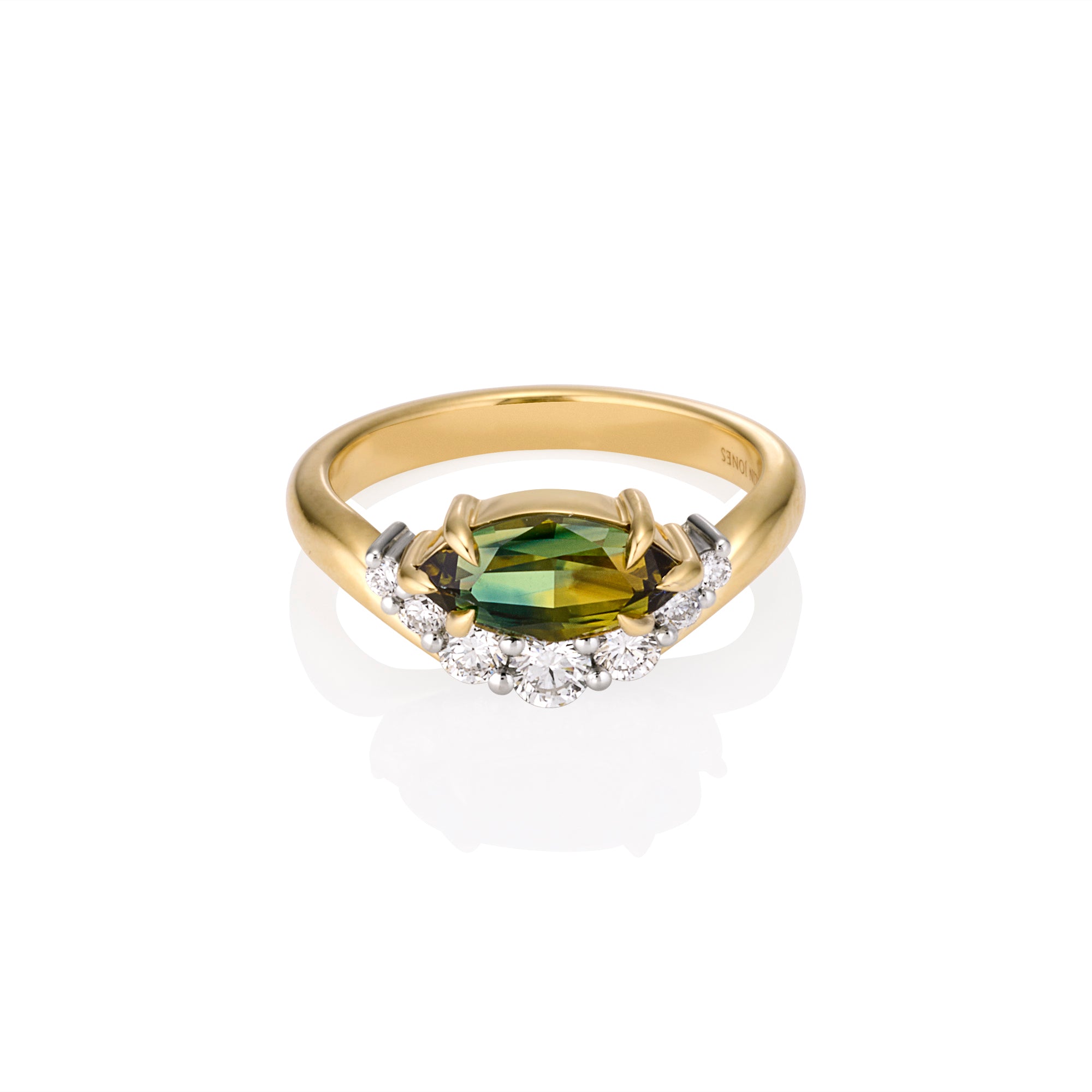 Engagement ring, marquise-shaped Australian Parti sapphire centre, surrounded by diamonds, set in 18ct yellow gold and platinum band. 