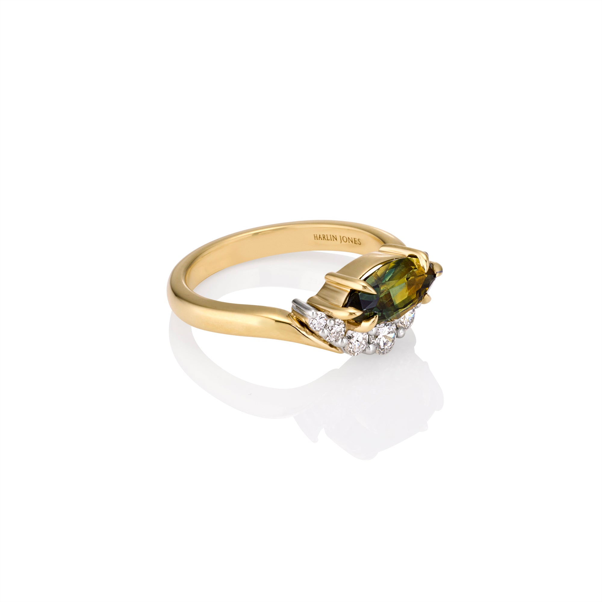 Side angle, showcasisng band and setting of ring
