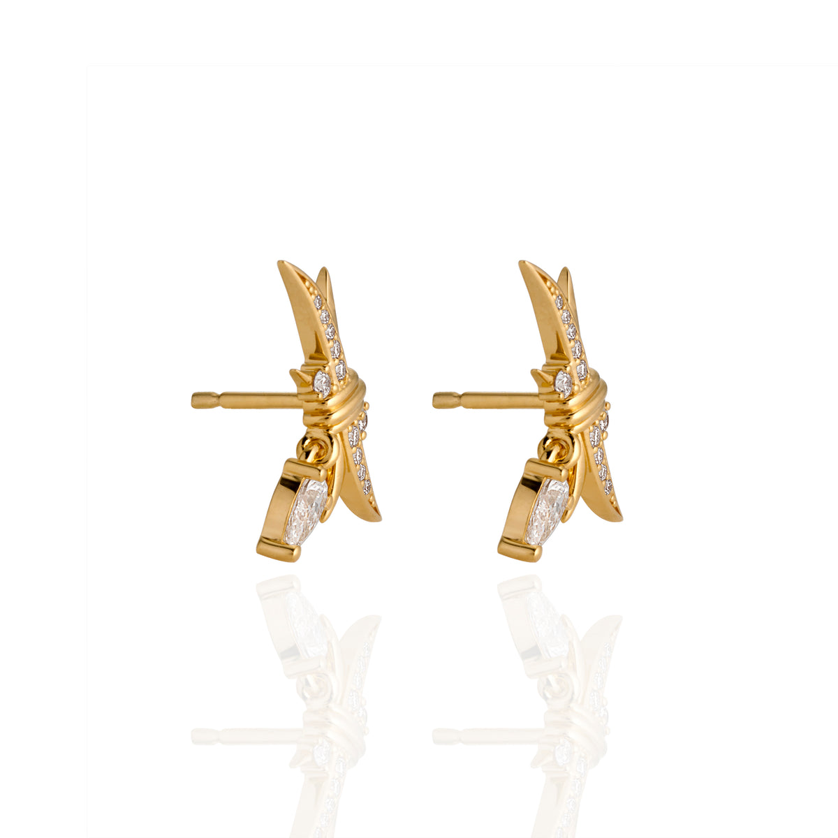 A pair of gold star-shaped stud earrings adorned with small clear stones, displayed on a clean white background with a soft reflection below.