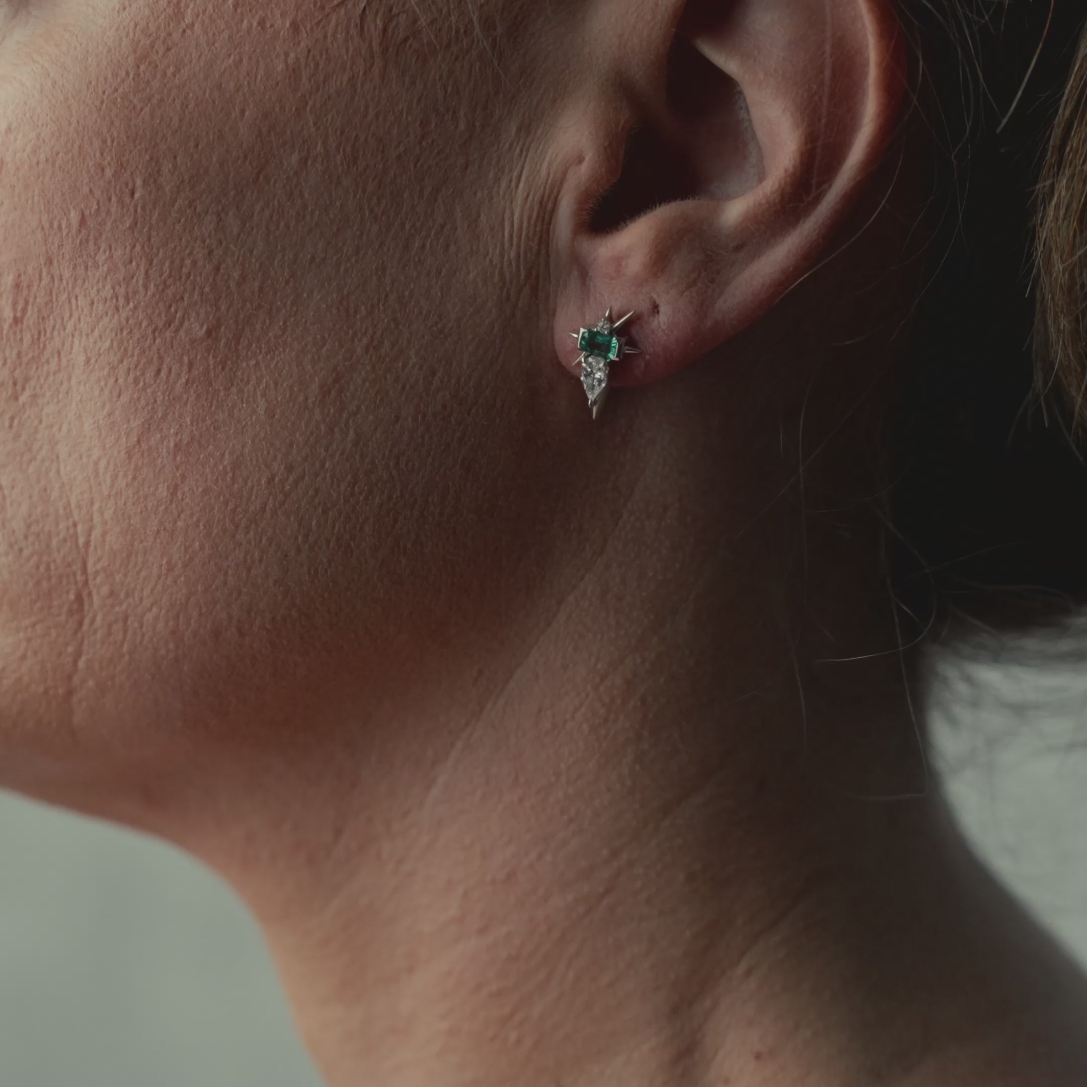 Video of model wearing earrings