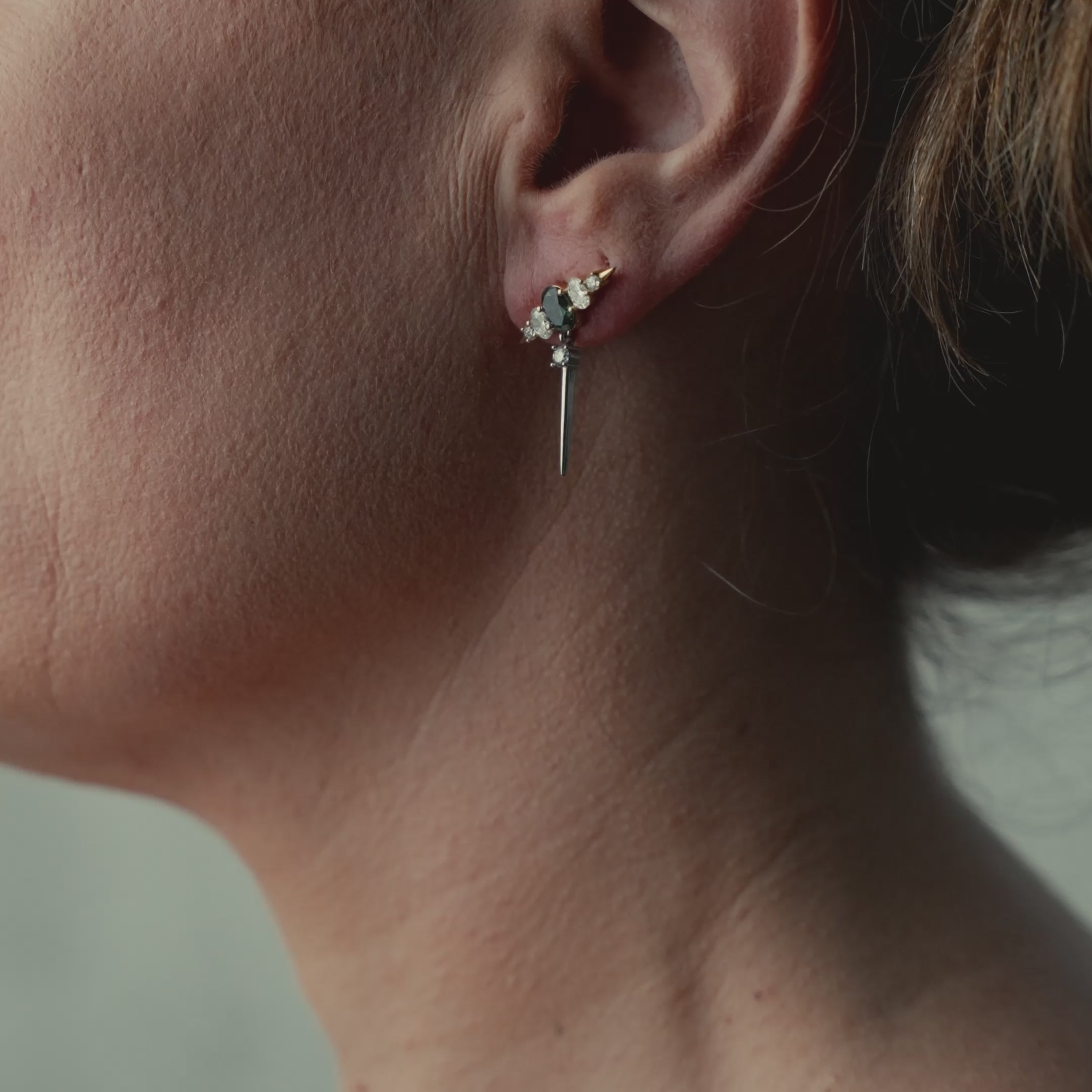Video of model wearing earring