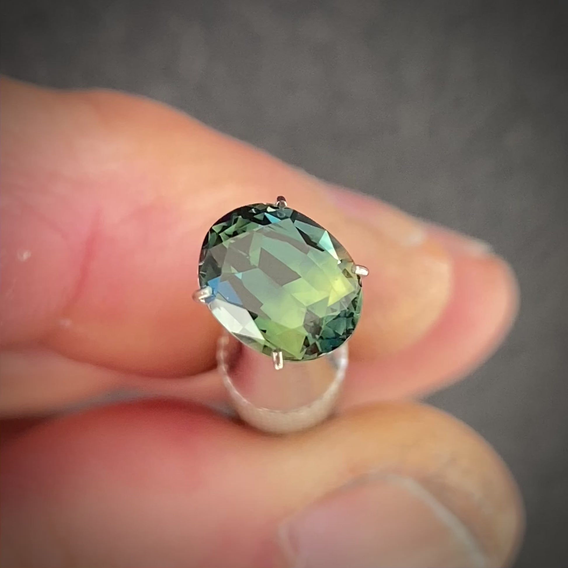 Australian parti sapphire loose gemstone spinning 