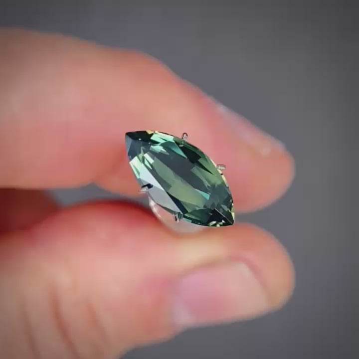 Video of teal Australian sapphire in marquises shape 