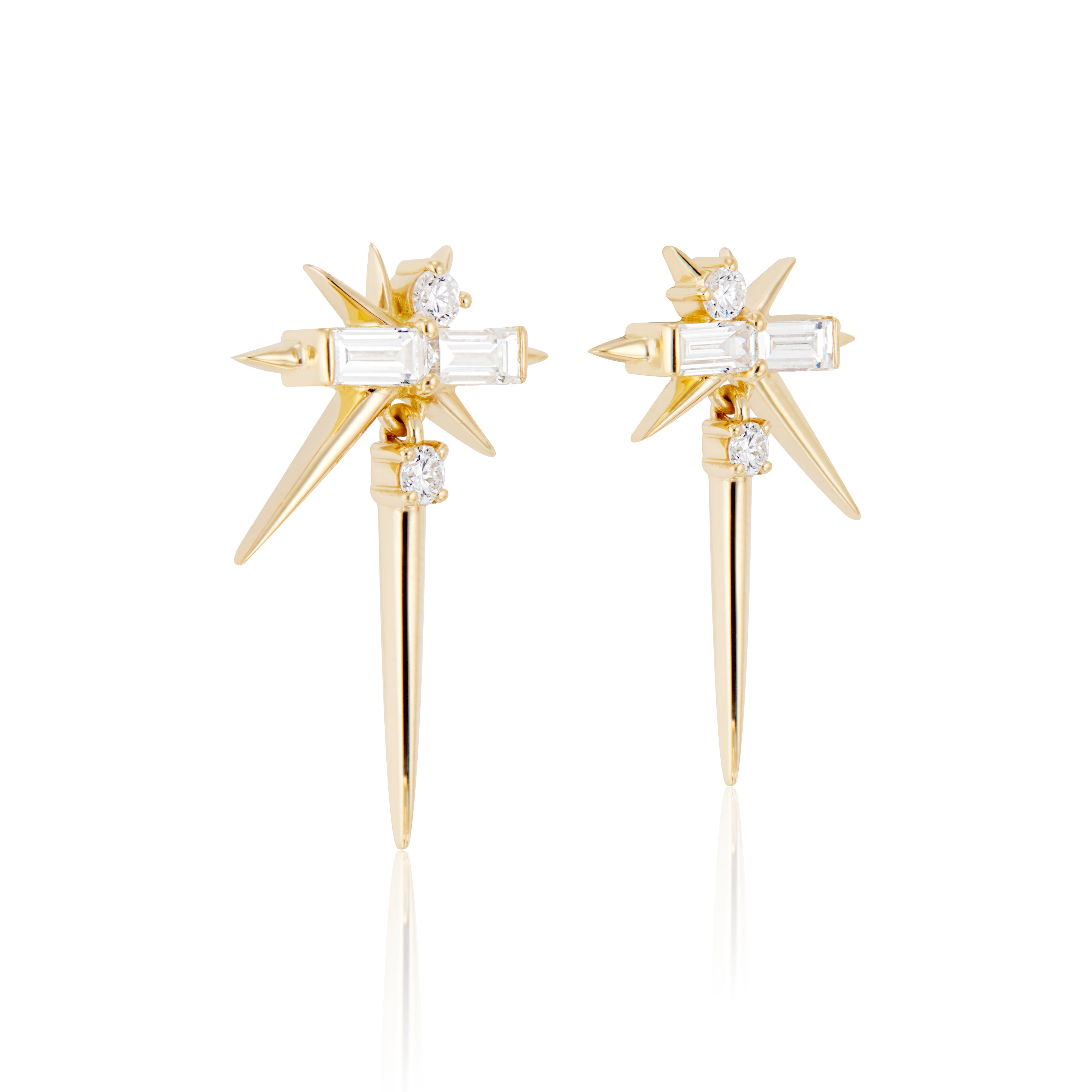 Gold starburst earrings with diamonds on a white background.