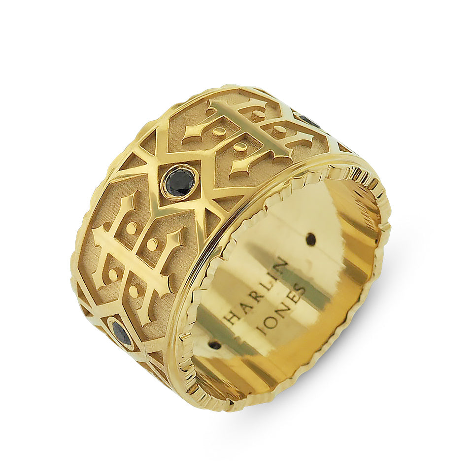 Yellow gold men's wedding band with 5 round black diamonds 0.25ct, 13.6mm wide with detailed pattern work and jagged edges 