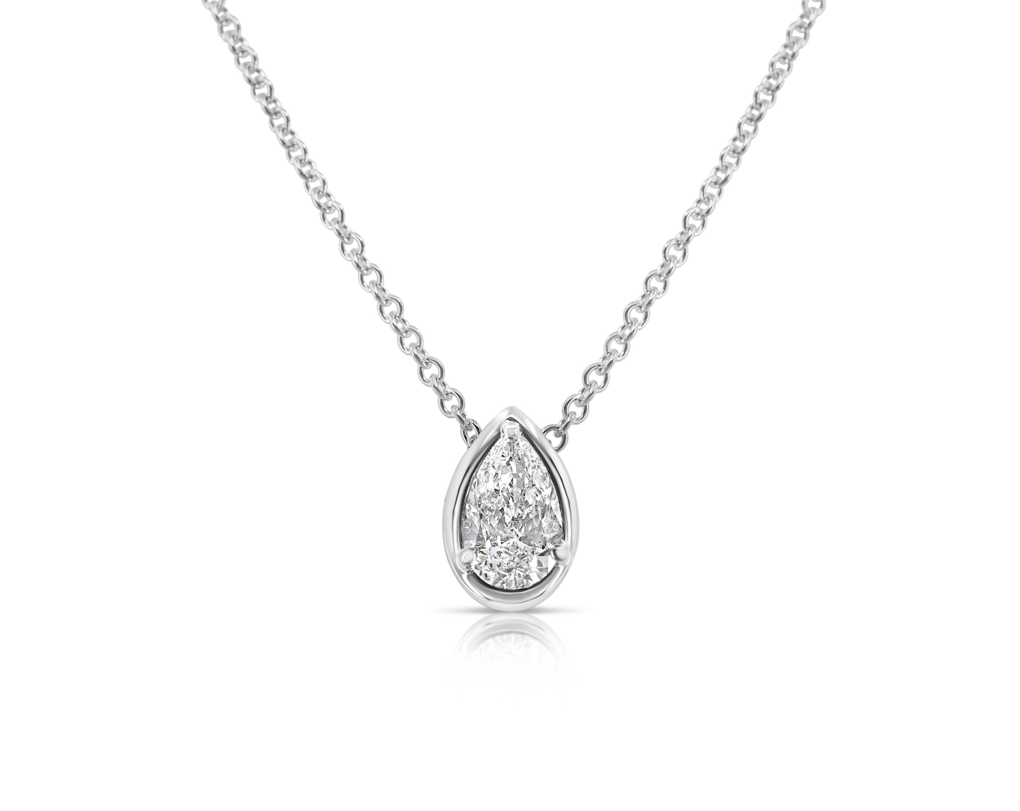 Front view of vertical pear-shaped diamond pendant necklace pointed up. The diamond is set in a white gold pear-shaped beveled setting, fixed with 3 rounded prongs. The white gold round-link chain connects at the back of the setting near the point.